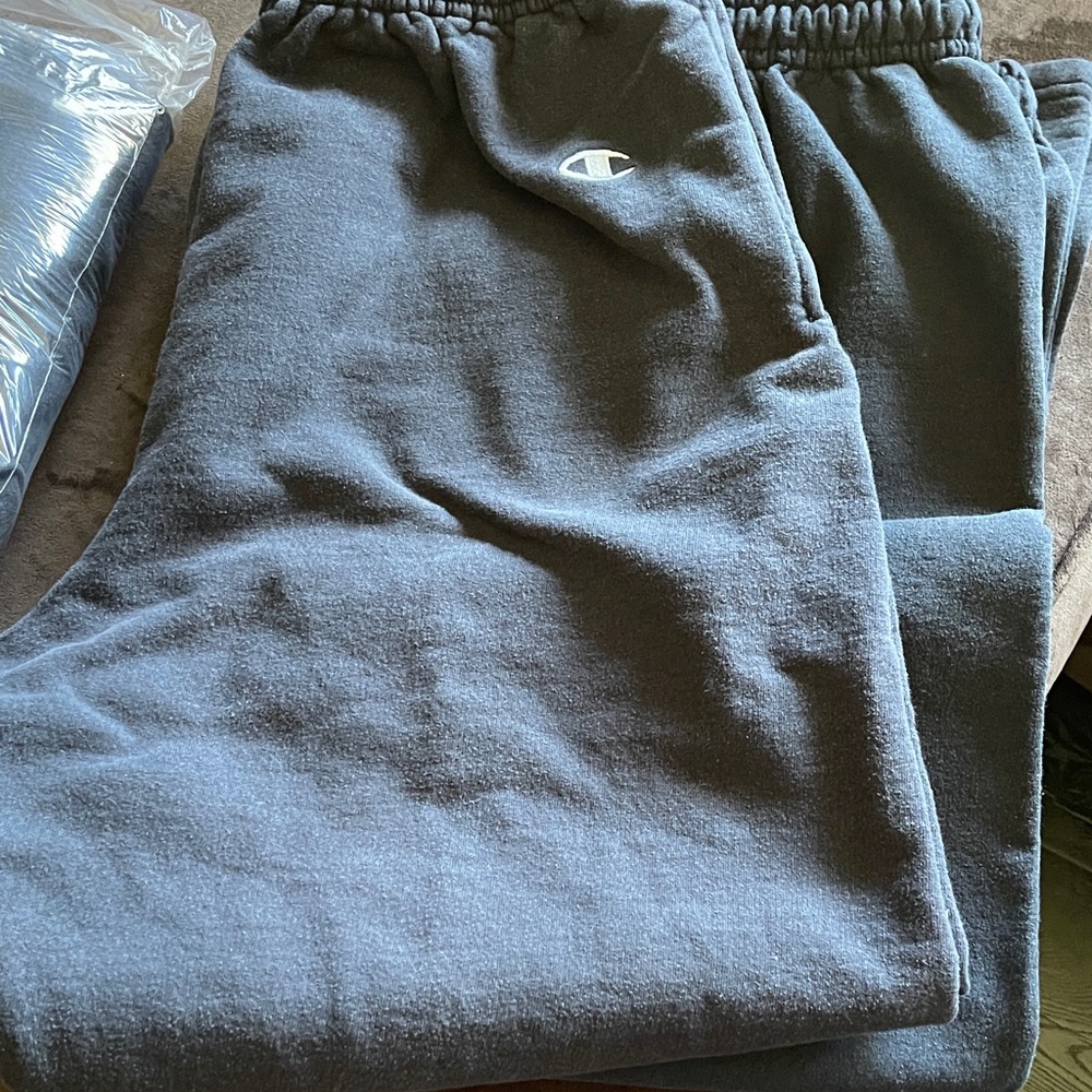 Champion black elastic bottom reverse weave sweat pant.